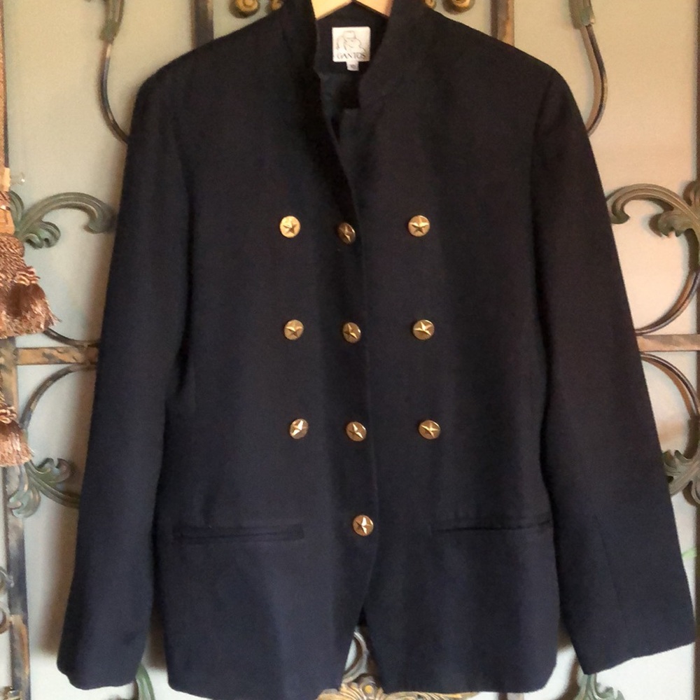 Stylish Military style women’s jacket fully lined, one button missing at neck.